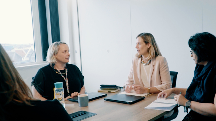 National Wealth Fund team members in a strategy meeting
